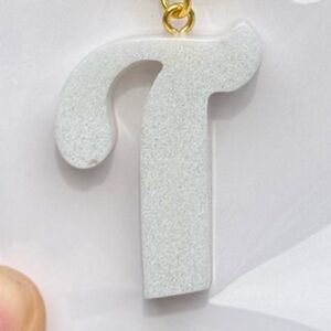 White “T” Keychain